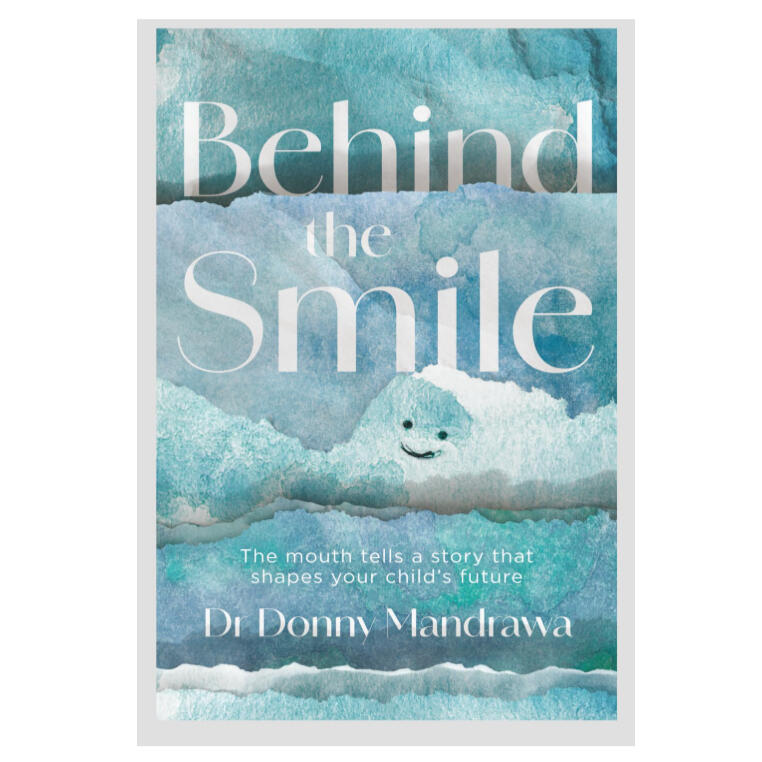 Book cover for 'Behind the Smile' by Dr. Donny Mandrawa